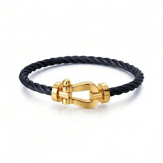 BRACELET CABLE NOIR DORE ( FRAD)